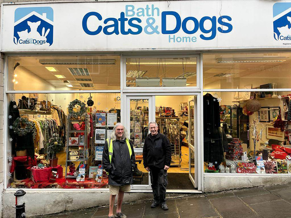 Volunteer van drivers Len and Nick outside one of our charity shops 