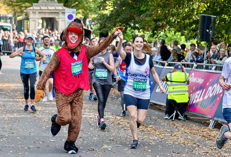 Runners dressed as cat and dog in Bath Half marathon_c Anna Barclay