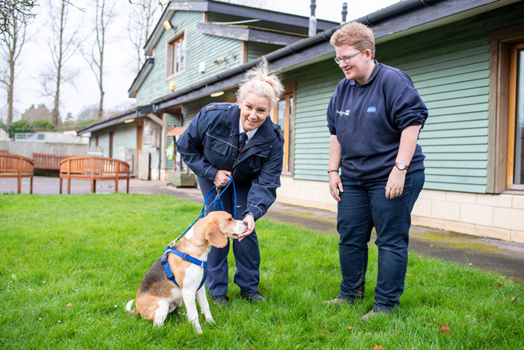 RSPCA Inspector and staff member with dog